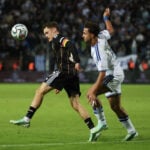 Manchester United bør gøre alt for at hente Brighton-angriberen Charalampos Kostoulas, men det bliver en dyr fornøjelse.